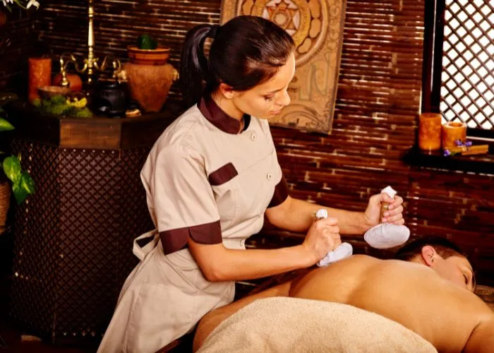 Coimbatore spa hotel with herbal pouch massage therapy for body relaxation